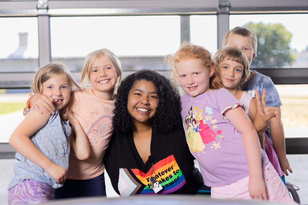 BGC Puget Sound staff poses with kids at after-school club | O