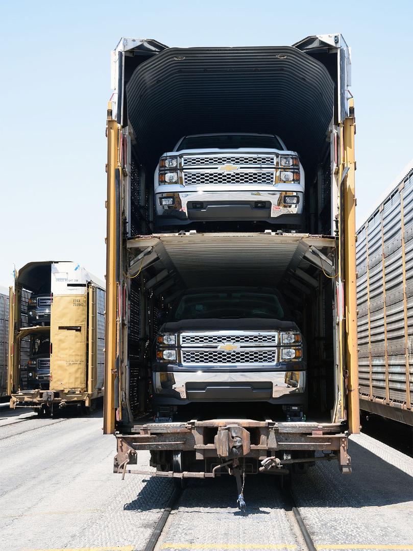 Vehicles wait to be unloaded at a Union Pacific auto facility.