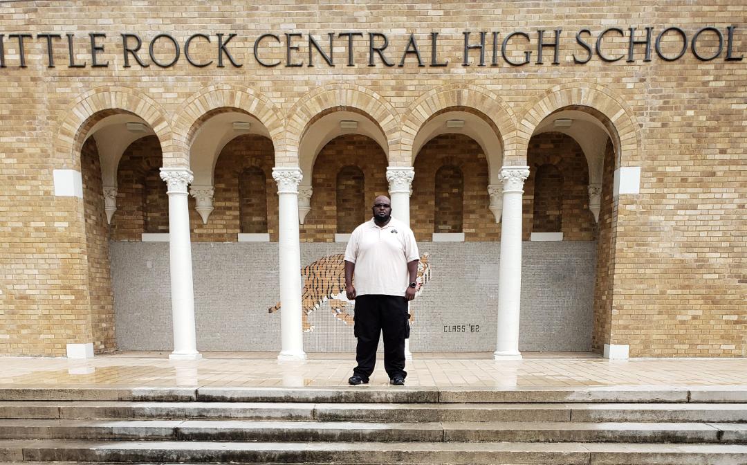 Union Pacifc locomotive engineer Harlee Watson stands outside his alma mater, Little Rock Central High School, one of the Open OutDoors for Kids locations supported by Union Pacifc.
