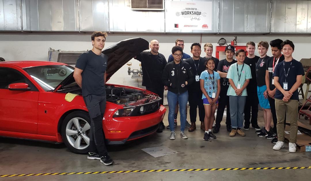 Teen Auto Workshop participants worked to upgrade a 2010 Ford Mustang.