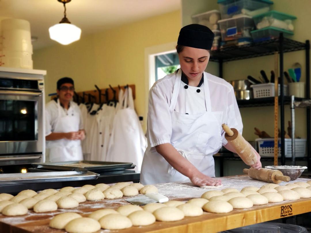 Medium Retina | Inside Track: Meristem School student making bread