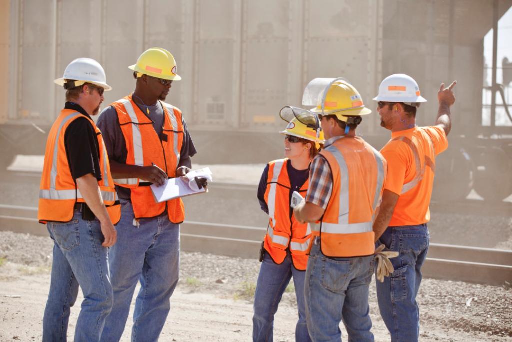 Union Pacific employees meeting in field.