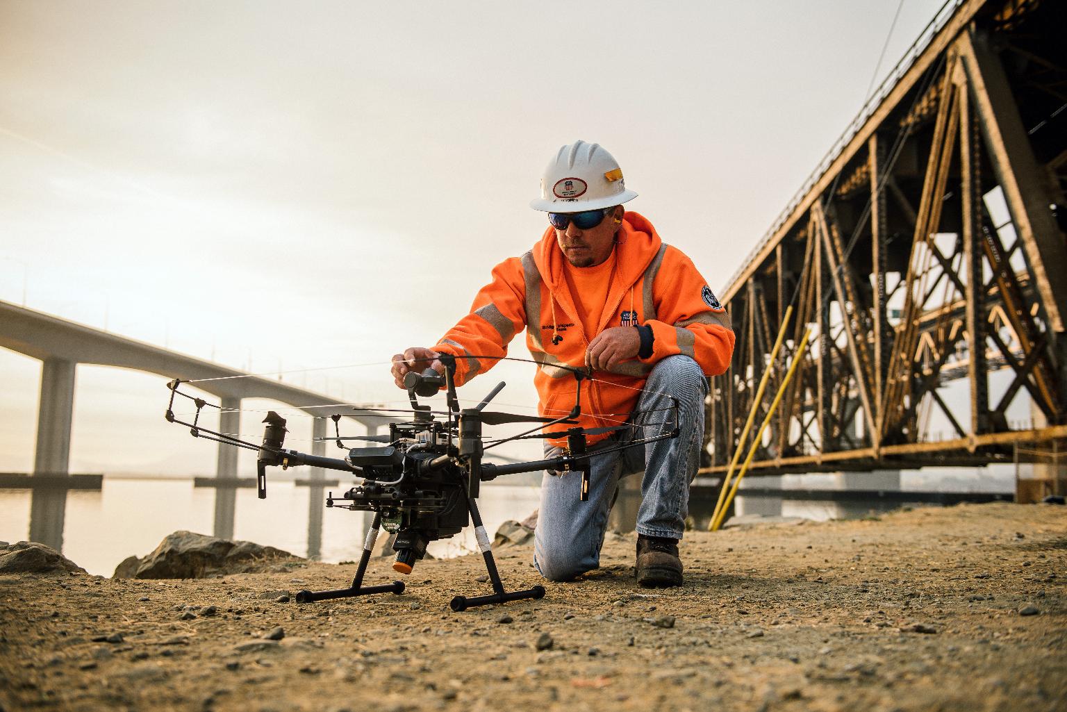 Large Retina | Bridge inspector George Otis with autonomous drone, California.