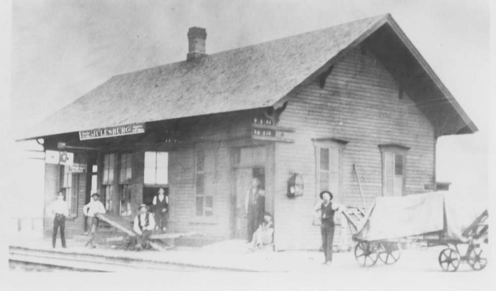 People in front of a train station in Julesburg, Colorado, 1890