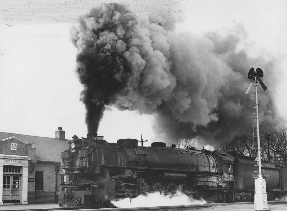 Photograph of steam locomotive UP 9085 leaving Julesburg, Colorado, 1930