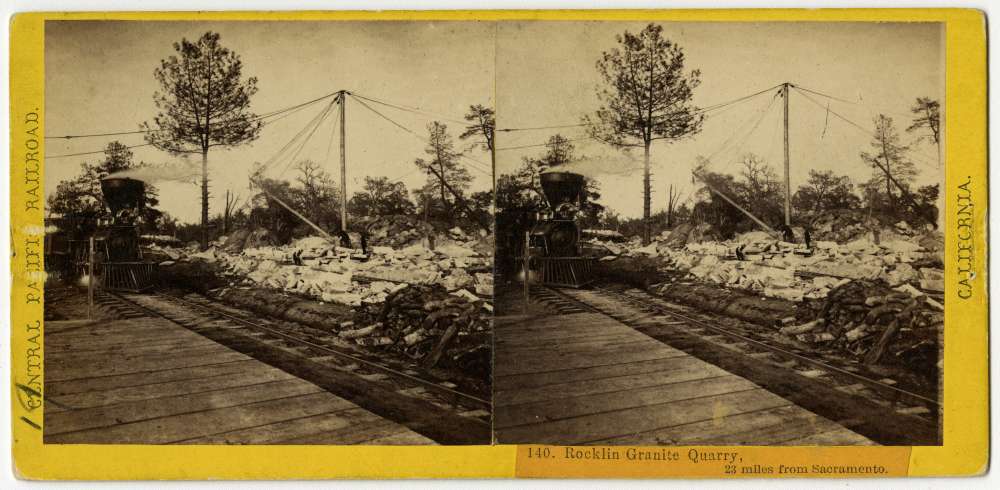 A stereo card showing a locomotive on the tracks next to the Rocklin Granite Quarry