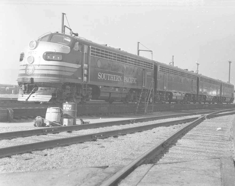 Photograph of locomotive SP 6157 and trailing units at Sparks, Nevada, 1949