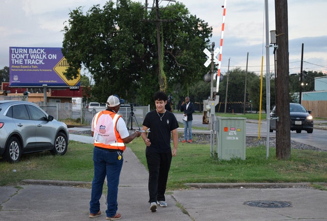 Kevin Brantley, an Engineering track foreperson for Union Pacific, shares rail safety information with students at Charles H. Milby High School on Aug. 12, the first day of the new school year for the Houston Independent School District.