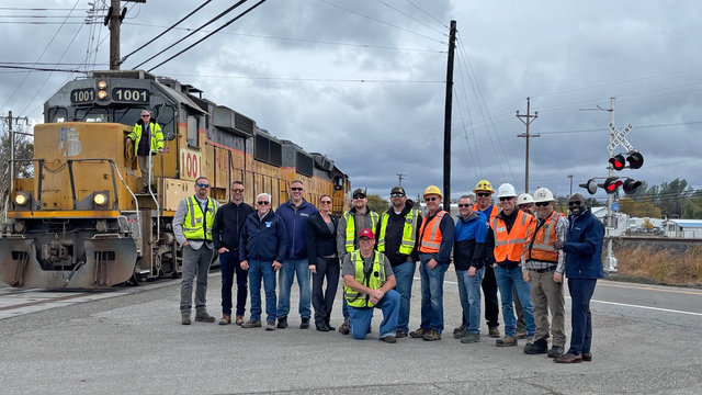 Cross-functional Union Pacific team celebrates enhanced crossing.