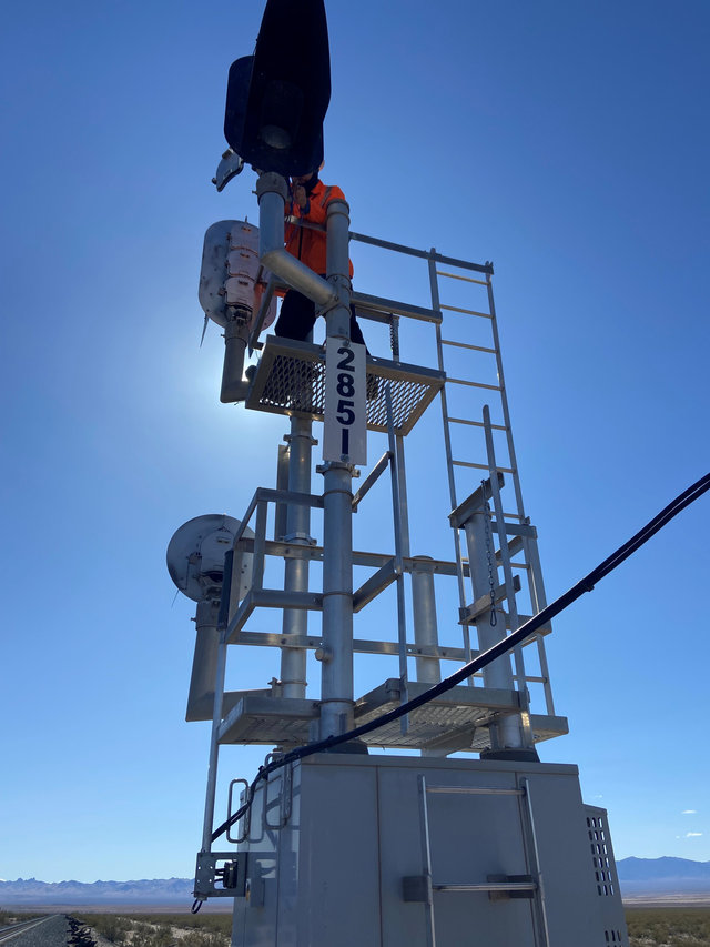 Signal Maintainer Conrad Whitaker repairs an LED signal head.