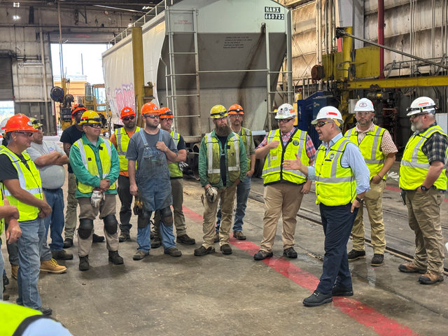 CEO Jim Vena engages with Car Shop team members during his field visit to North Platte.