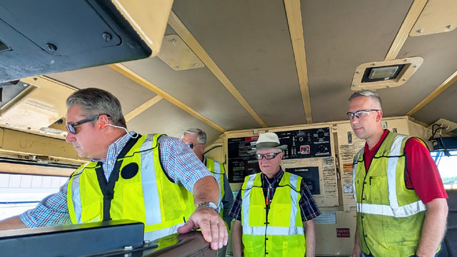 From left, Jason Nalder, senior manager-Train Operations, Transportation; California State Senator Jerry McNerney; and Josh Howe, senior director-Mechanical Operations, tour a locomotive cab. The senator and TRACC students toured Stockton, California, to learn about Union Pacific operations.