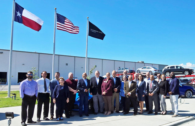 Volkswagen, Port Freeport and Union Pacific representatives mark the opening of VW's new vehicle processing center in Freeport, Texas.