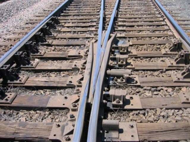 Track component, known as a frog.
