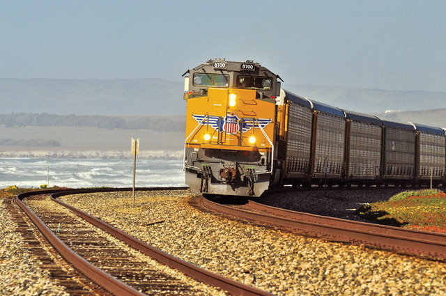 Southbound train UP 8700 pulling autoracks along the coast neat Lompoc, CA