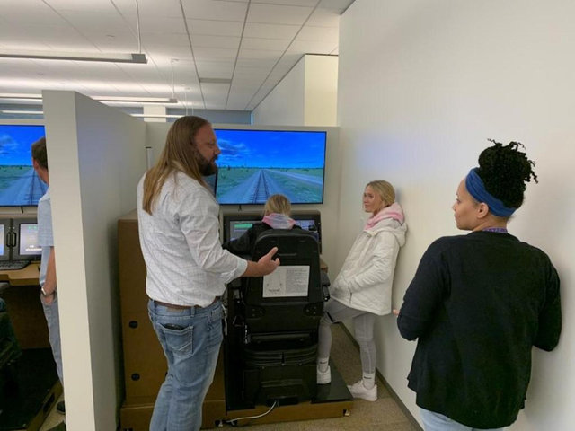 Large | Jeremy Elmendorf discusses work on the railroad with students