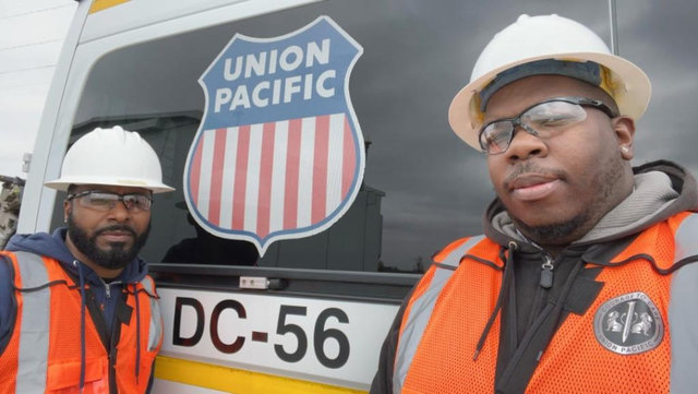 Large | Derrick Beard and Lionel Nelson helped save a motorist.