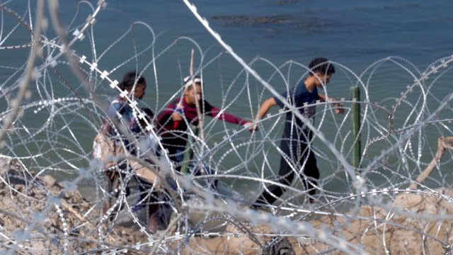Migrants Crossing the Border at Eagle Pass, Texas | M
