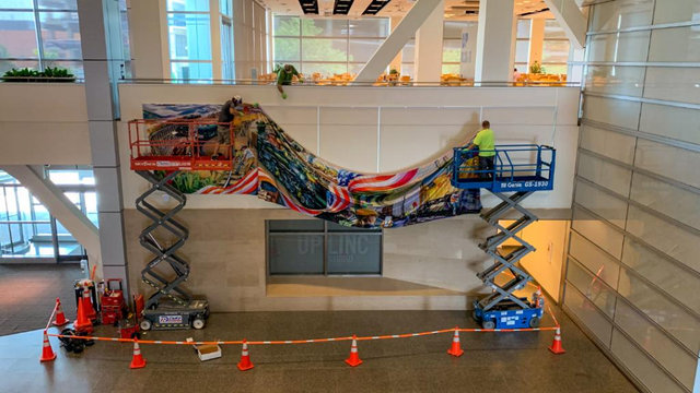New UPC mural is installed above UPLINC. | L