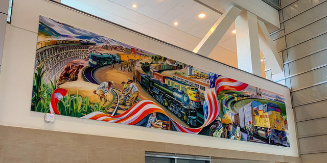New history mural over UPLINC at UPC. | L