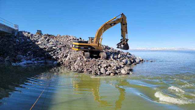 The railroad helped raise the causeway berm to create a healthier, less salty lake.