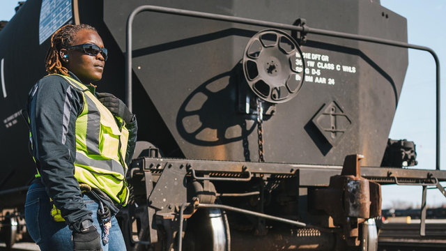 Yardperson Davida Flowers visually inspects a tank car | MR