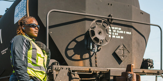 Yardperson Davida Flowers visually inspects a tank car | MR