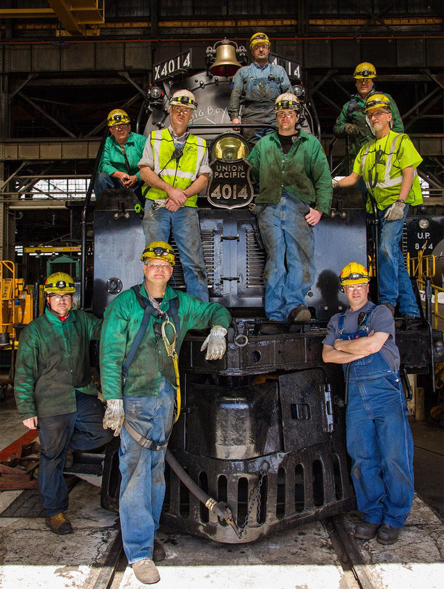 Union Pacific steam crew members posing in front of Big Boy No. 4014 locomotive during a commemorative event.