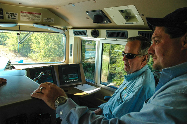 Large Retina | George H.W. Bush in the cab of UP 4141