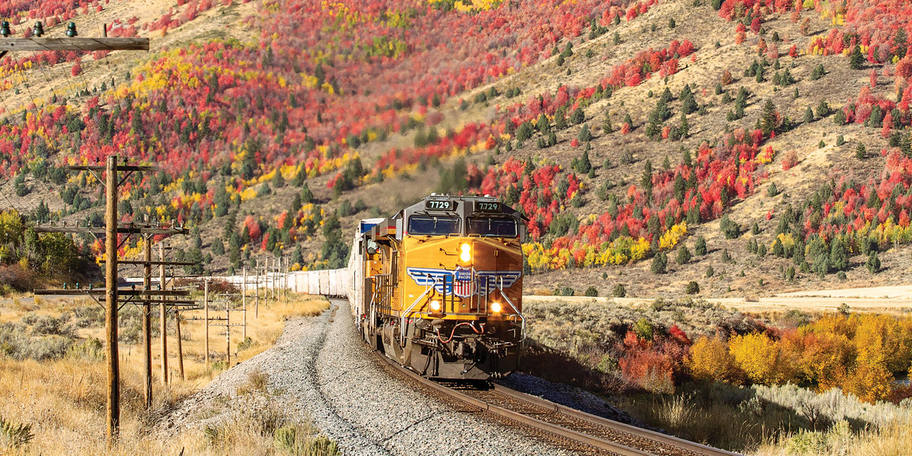 UP 7729 leading refrigerated boxcars near Pebble, Idaho. | L