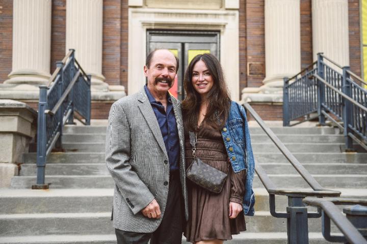 Medium | Nick Garcia and his daughter, Noel, outside the UP Museum
