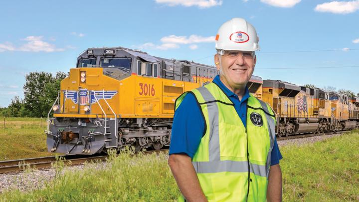 Union Pacific CEO Jim Vena with a UP Locomotive | M