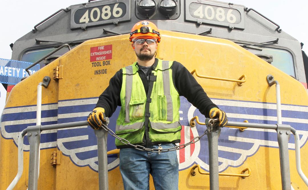 Mechanical Service Operator Camron Cox works to keep locomotives running at the Kansas City Locomotive Shop in Missouri.