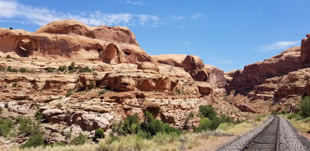 Union Pacific tracks traverse some of our country’s most beautiful natural wonders, including Corona Arch in Moab, Utah.