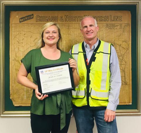 OHN Jessica Carson, left, and Senior Vice President – Transportation, Northern Region Shane Keller at Carson’s UP Way graduation.