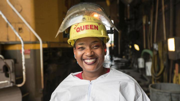 Andrea Davis brings spunk to every part of her day, from her “All Hail the Queen” hard hat to her conversations with colleagues.