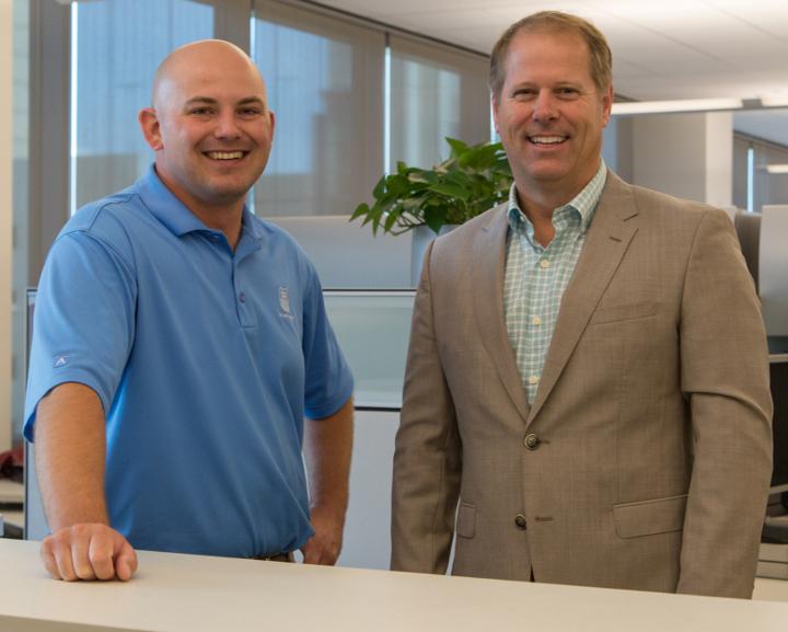 John Miller, systems engineer, left, and Hunt Cary, vice president-Harriman Dispatching Center, Operating Services, helped create UP Vision, providing employees a real-time snapshot of Union Pacific's network.