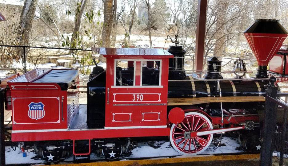 Visitors practice safe habits around railroad tracks as they experience Denver Zoo’s sights and sounds.