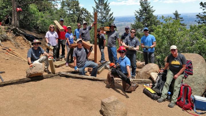 Rocky Mountain Field Institute volunteers work to make improvements along Barr Trail, one of the primary summit trails to the top of Pikes Peak, Colorado.