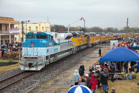 Small | Locomotive No. 4141 passes through Navasoto, Texas