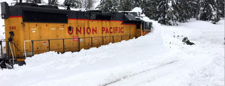 Medium | Inside Track: Avalauncher Locomotive buried in snow