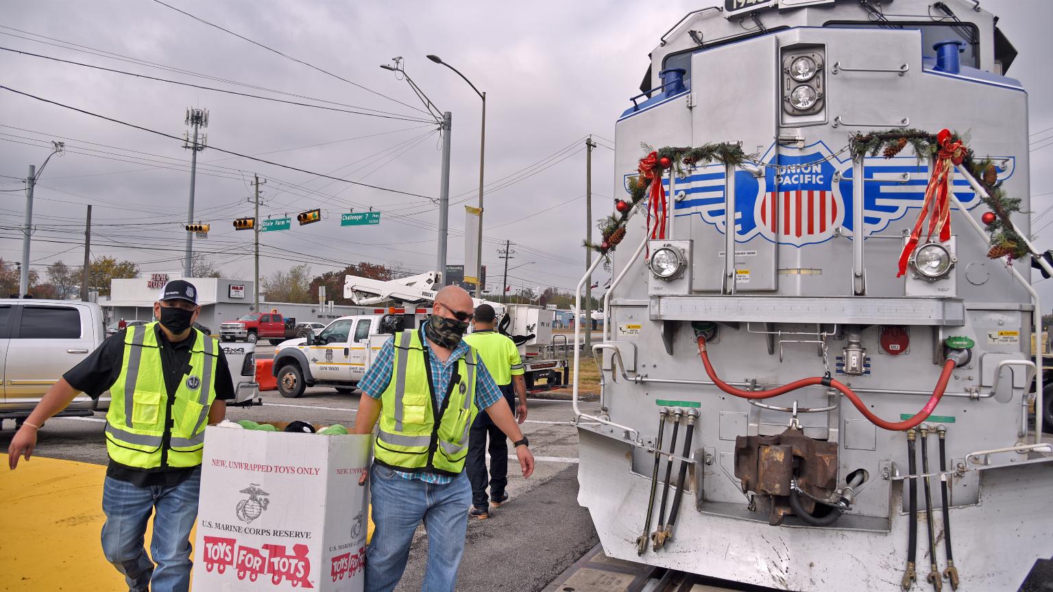 Union Pacific Employees Delivering Toys For Tots