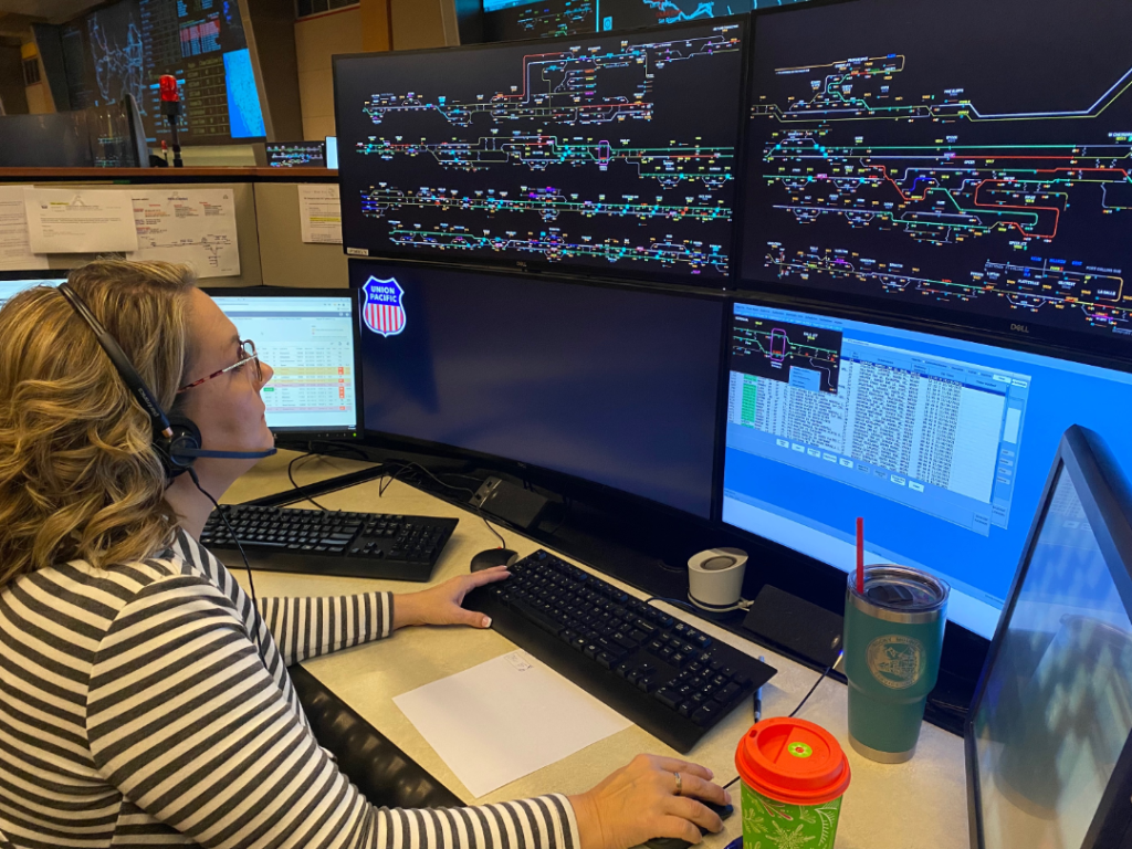 Large | Train Dispatcher Rene Burkart uses the new CADX system