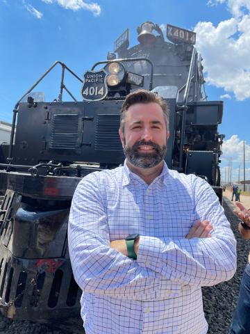 Small | Nathan Anderson poses in front of Big Boy UP 4014