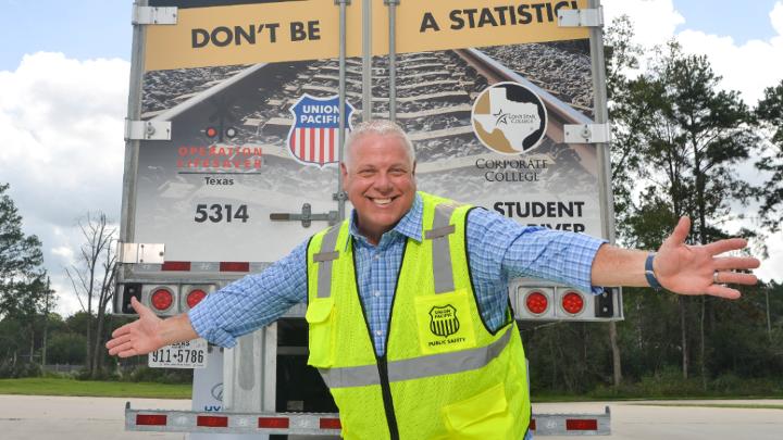 Buck Russel poses in front of a truck Insights Main Image | M