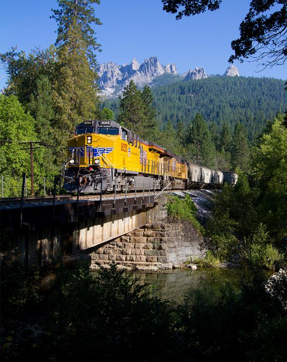 UP 8055 (EMD SD9043MAC) crosses a small bridge near Castle Crags State Park, California.