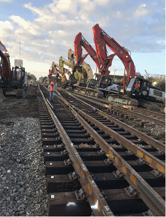 A fleet of backhoes replace 17 switches within 59 hours.