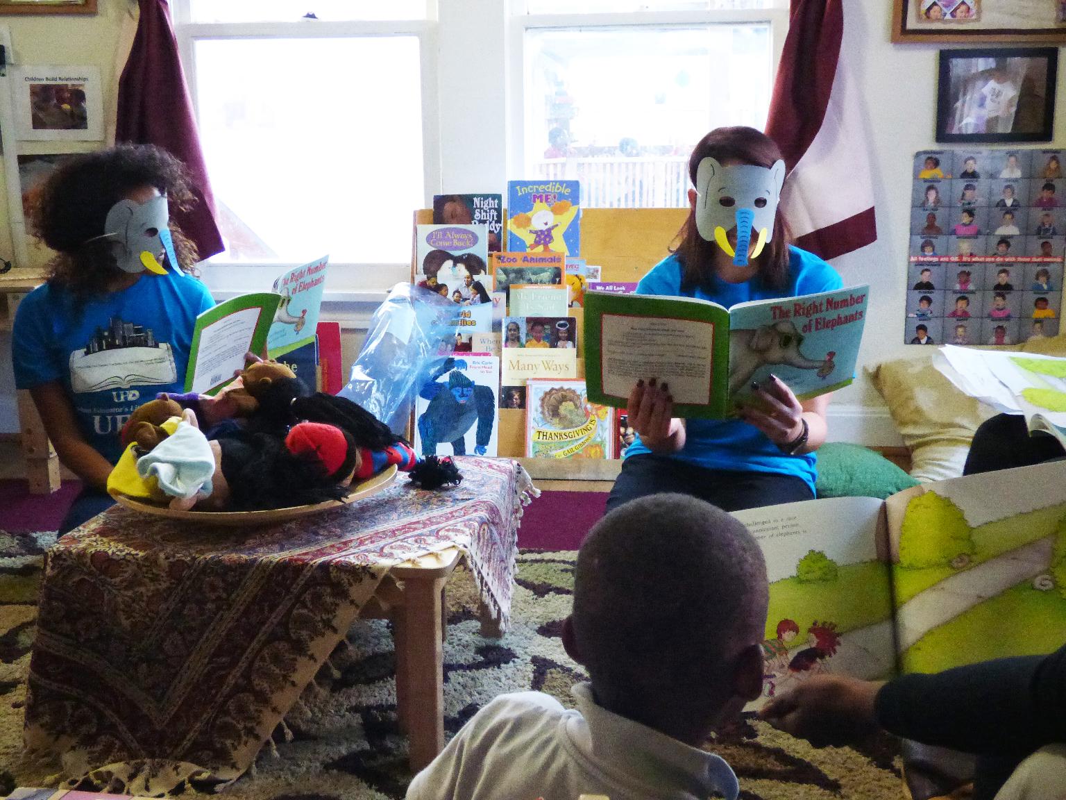 Large Retina | Lauren Thomas and Bianca Alcala read to children.