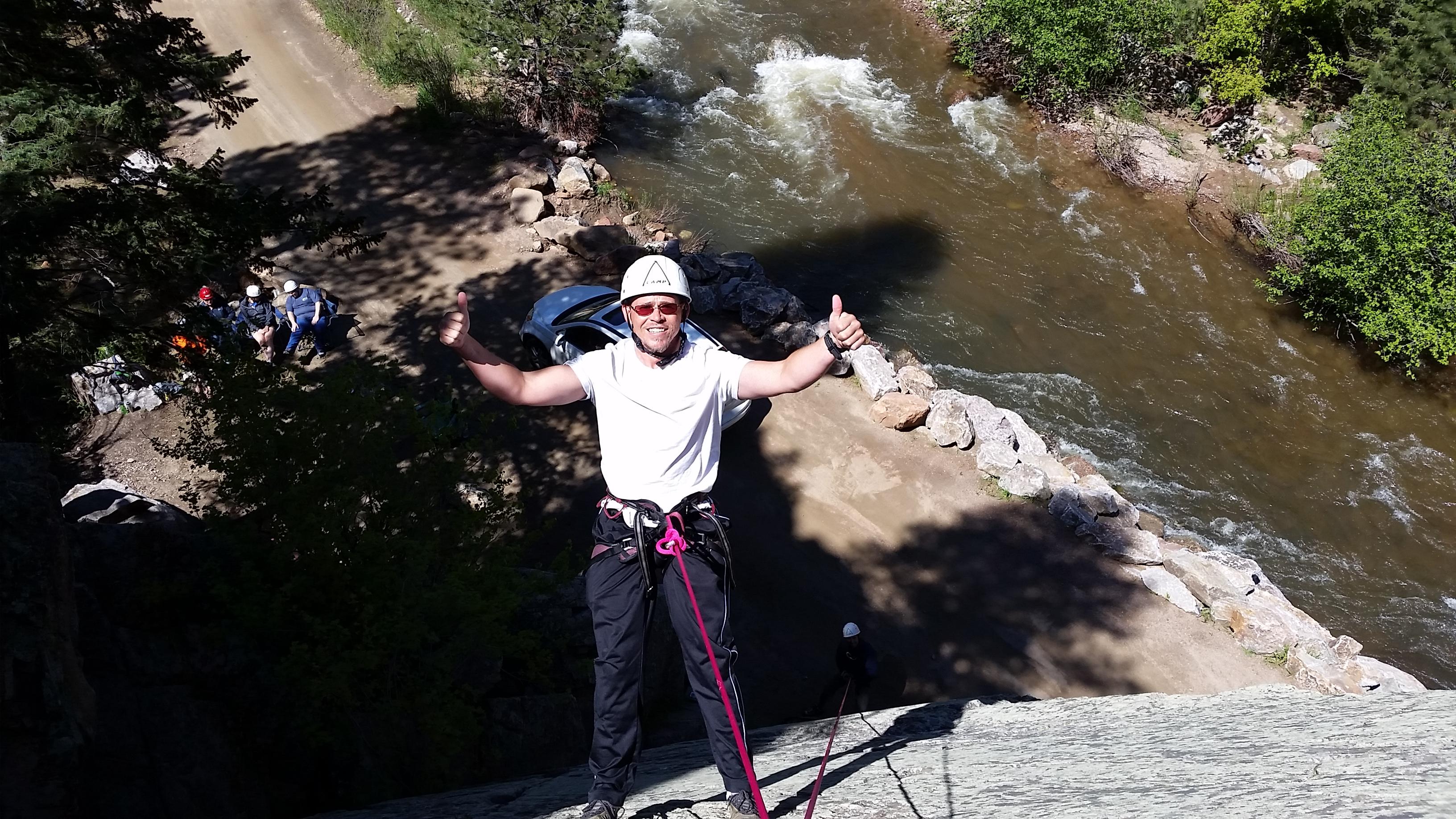 Jarrod S, NSCD participant, rock climbing.