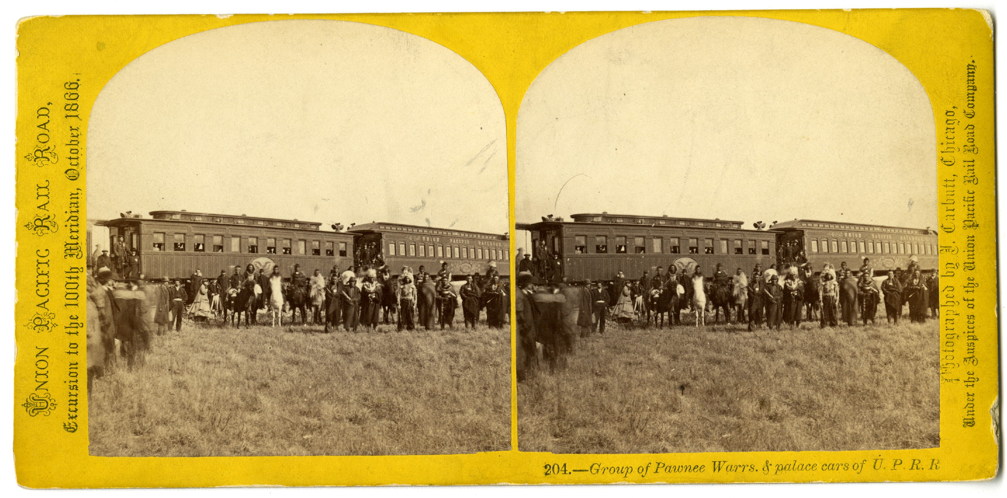 This image shows a company of Pawnee Scouts and Union Pacific excursionists arranged in front of the excursion train